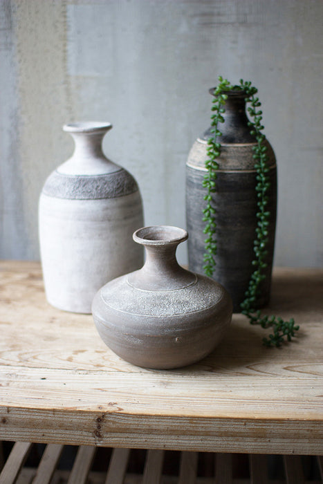 Set of 3 black grey and white clay vessels